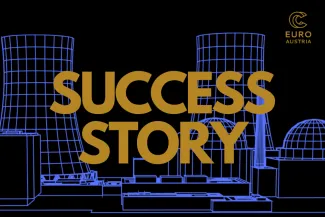 In the background a stylised nuclear power plant, in the front the title "Success Story"